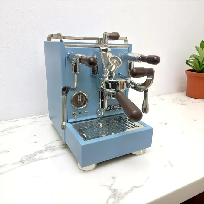 Torre Luigino Heat Exchange HX Espresso Machine in light blue on a white marble countertop